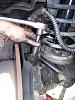 How To Adjust Your Swivel Pin Preload-tightening-bolts.jpg