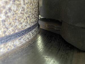 Rear wheel chirp / squeak when driving, but gone when brakes applied-img-3873.jpg